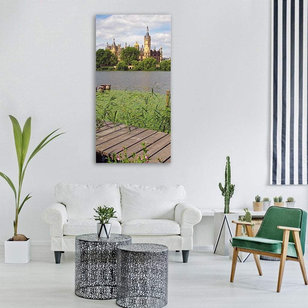 Schwerin Castle by the Lake Vertical Canvas Wall Art in brown, green and blue, single vertical panel hung on a wall