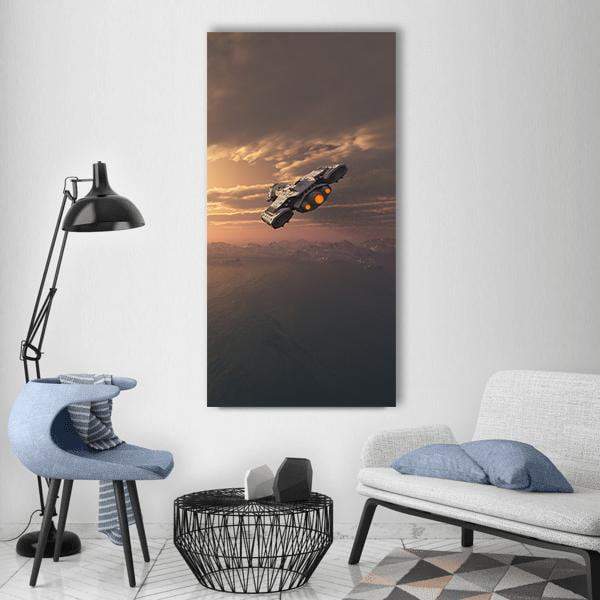 Sci-fi Spaceship Over Snowy Peaks Vertical Canvas Wall Art in black, gray and orange, single vertical panel hung on a wall