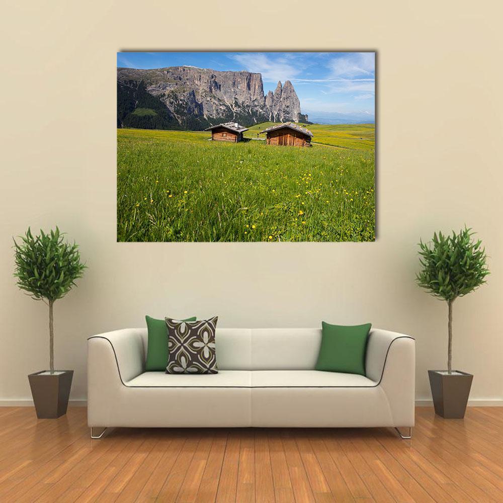 Sciliar Mountain Massif with Santner Peak Canvas Wall Art in gray, green and blue, single panel hung on a wall
