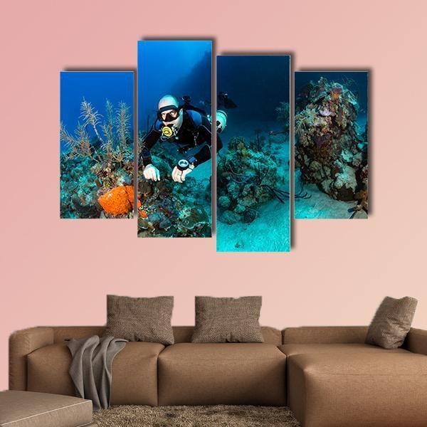 Scuba Diver On A Tropical Coral Reef Canvas Wall Art-4 Pop-Gallery Wrap-50" x 32"-Tiaracle