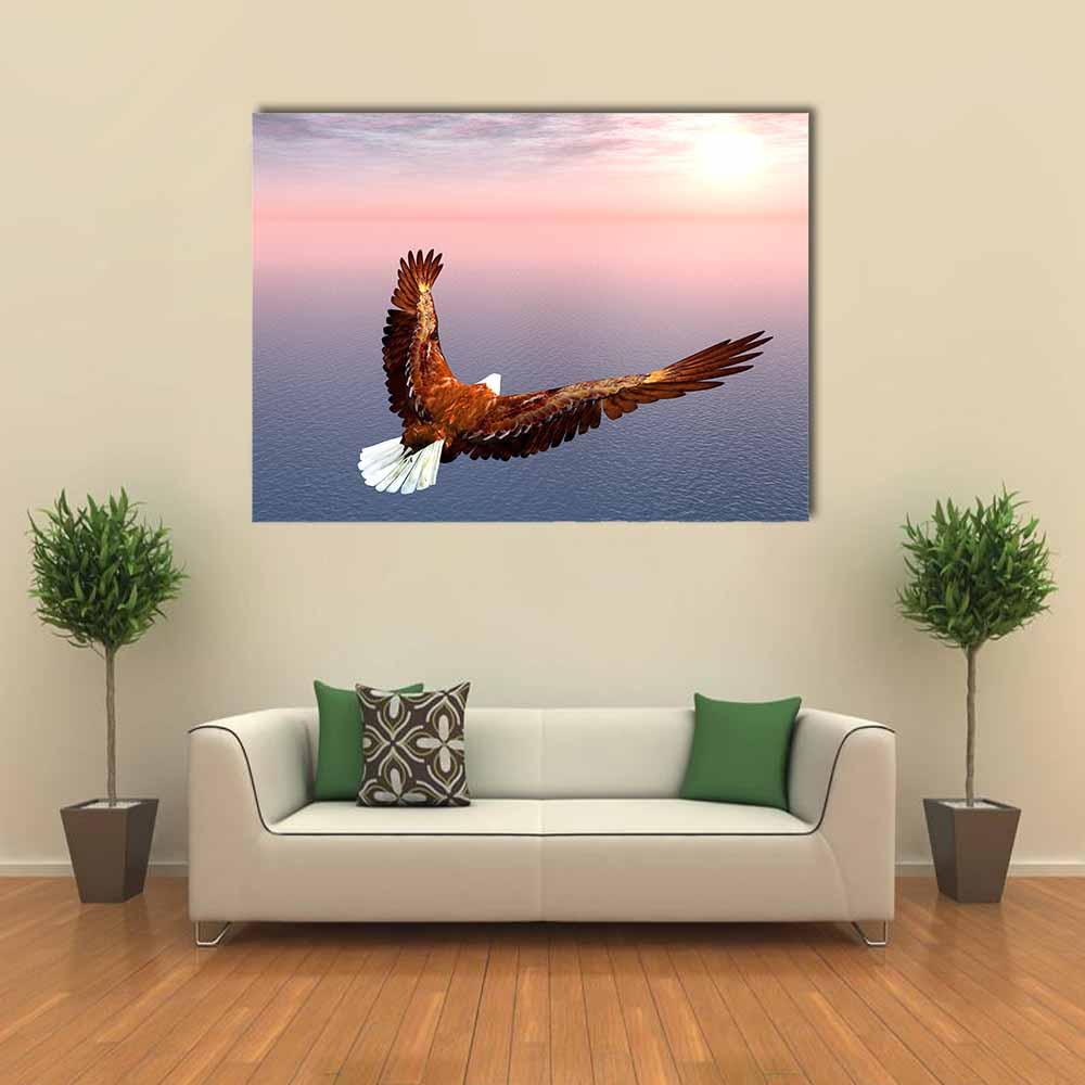 Bald Eagle Over Ocean at Sunset Canvas Wall Art in brown, blue and pink, single panel hung on a wall