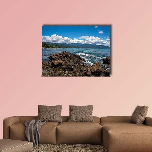 Chuspa Beach Seascape Canvas Wall Art in white, brown and blue, single panel hung on a wall