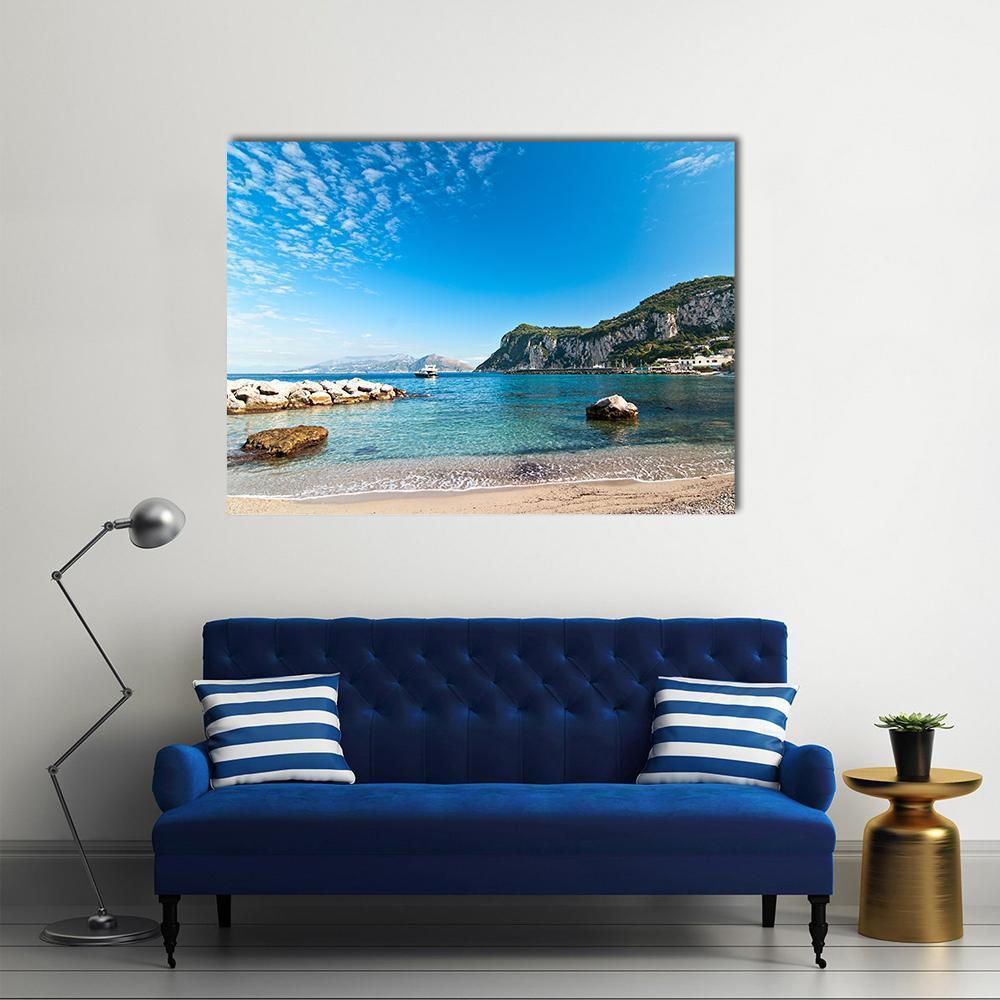 Capri Seascape with Cliffs and Boats Canvas Wall Art in white, beige and blue, single panel hung on a wall