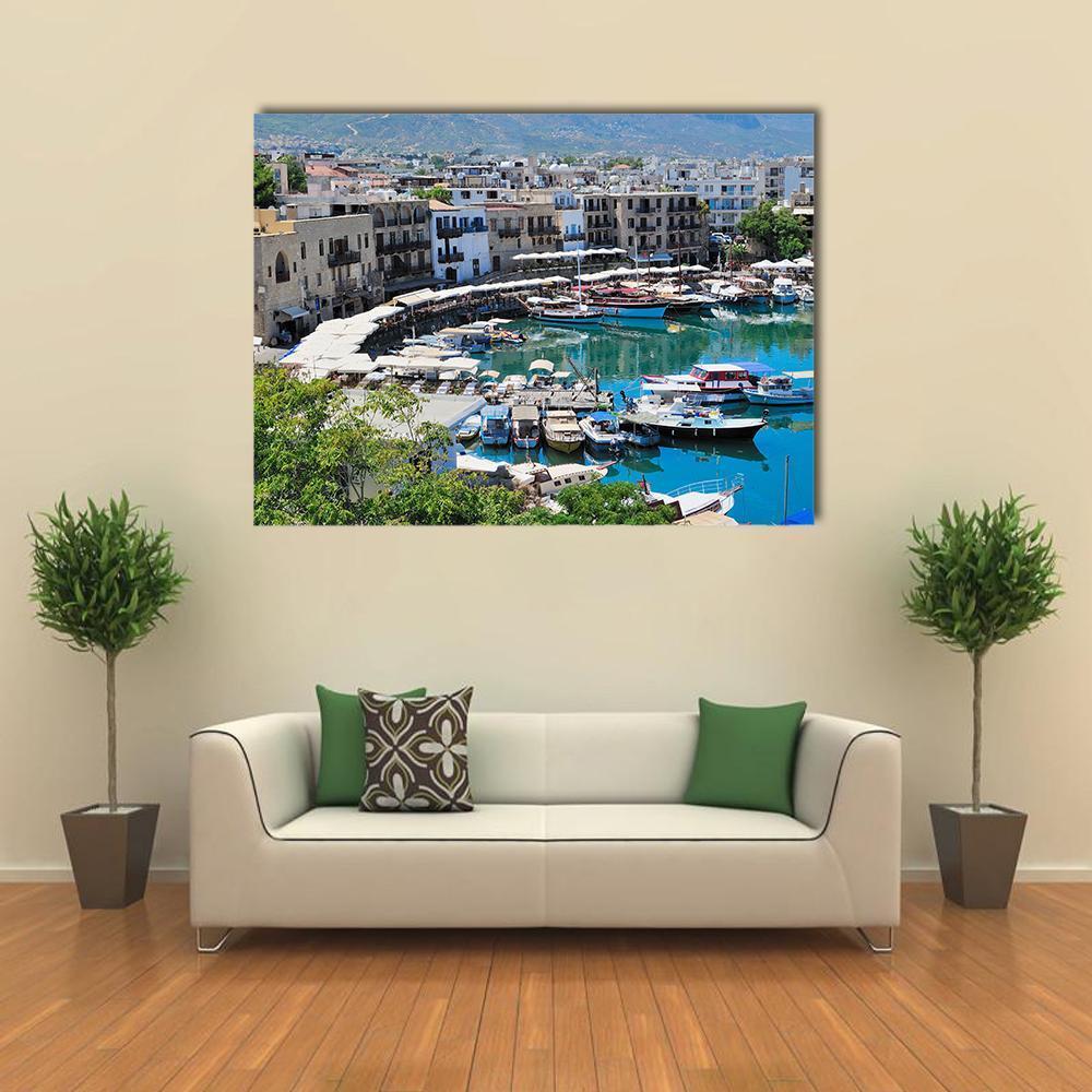 Sunny Harbor Pier with Docked Boats Canvas Wall Art in white, beige and blue, single panel hung on a wall