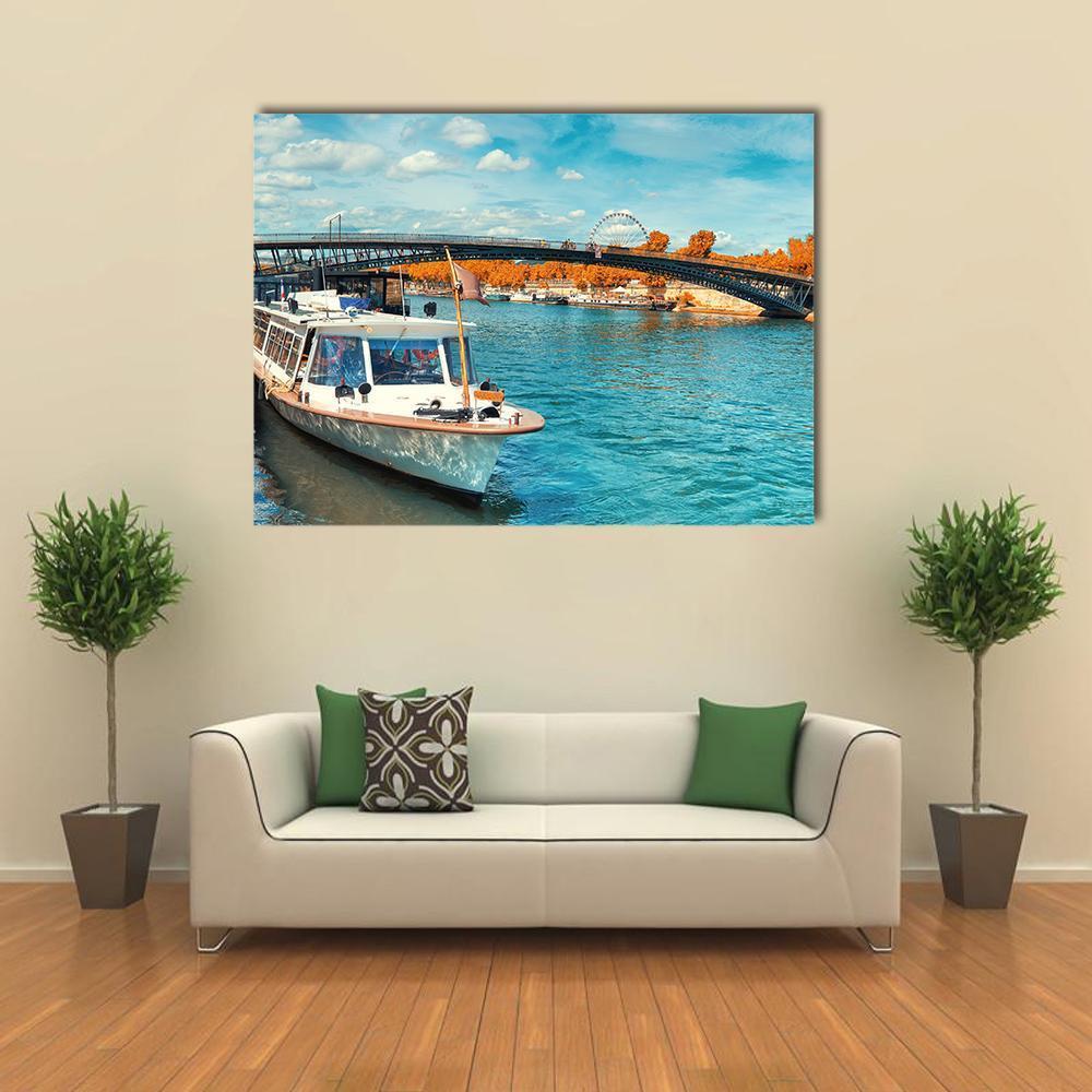 Seine River in Autumn Canvas Wall Art in orange and blue, single panel hung on a wall