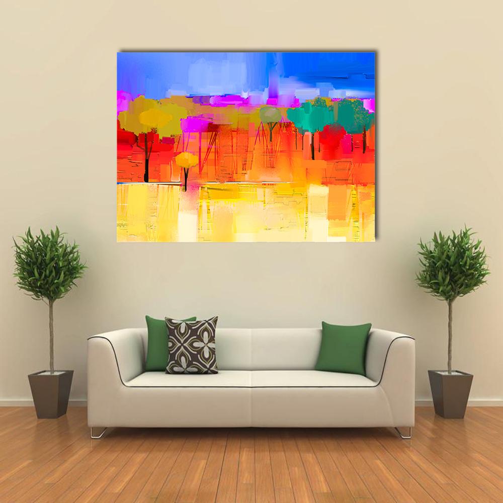 Semi-abstract Tree and Field at Sunset Canvas Wall Art in orange, yellow and multicolor, single panel hung on a wall