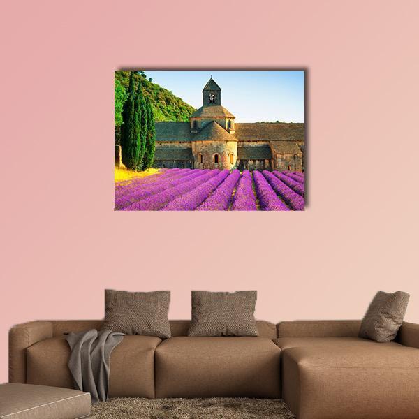 Sénanque Abbey with Lavender Fields Canvas Wall Art in gray, green and purple, single panel hung on a wall