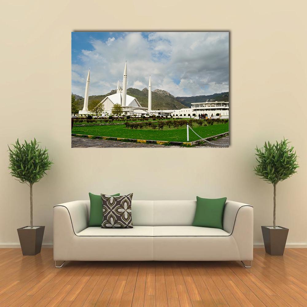 Shah Faisal Mosque with Margalla Hills Canvas Wall Art in white, green and blue, single panel hung on a wall