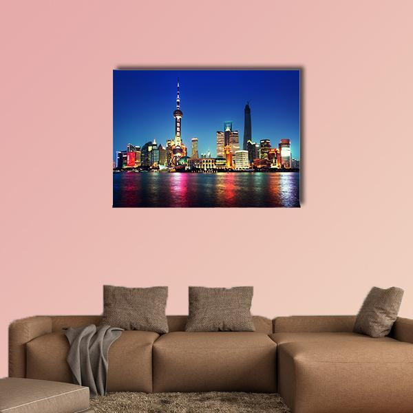 Shanghai Night Skyline with Oriental Pearl Tower Canvas Wall Art in black and blue, single panel hung on a wall