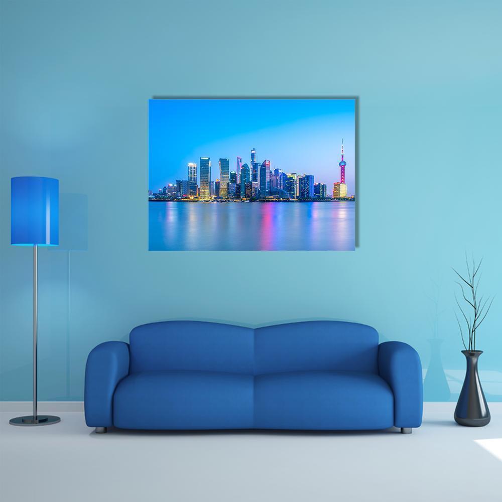 Shanghai Skyline at Dusk Canvas Wall Art in blue and purple, single panel hung on a wall