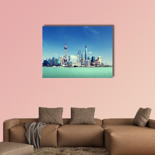 Shanghai Skyline on a Sunny Day Canvas Wall Art in green and blue, single panel hung on a wall