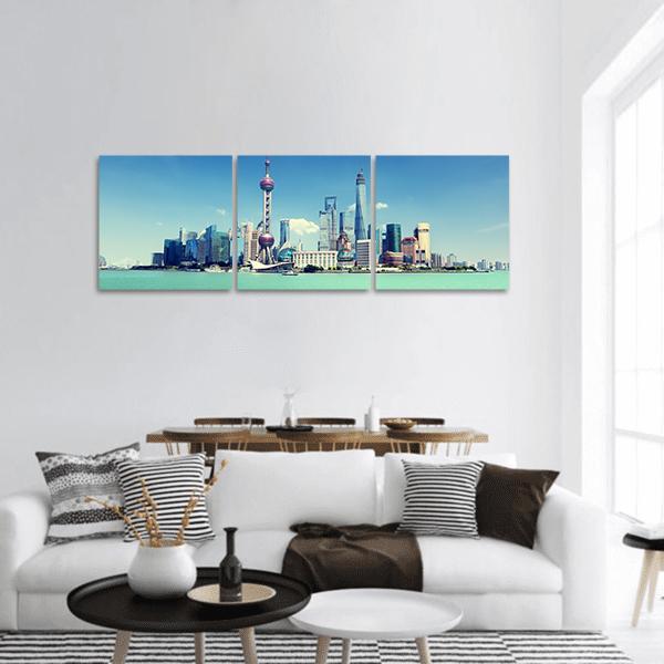 Shanghai Skyline on a Sunny Day Panoramic Canvas Wall Art in white and blue, hung on a wall
