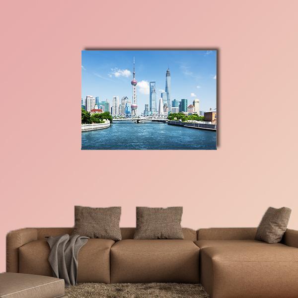 Shanghai Skyline on a Sunny Day Canvas Wall Art in white, gray and blue, single panel hung on a wall