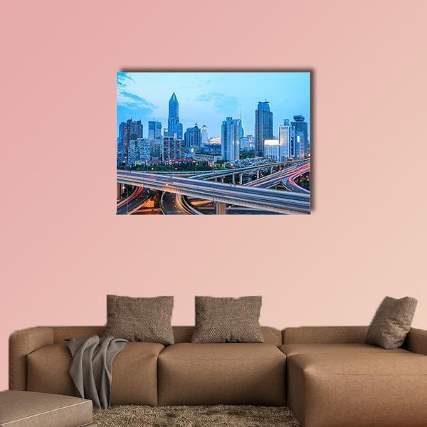 Shanghai Skyline with Highway Traffic at Dusk Canvas Wall Art in gray and blue, single panel hung on a wall