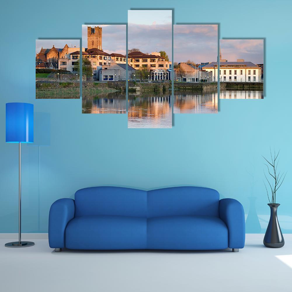 Shannon River Townscape at Sunset, Ireland Canvas Wall Art in white, orange and blue, 5 panel Star layout hung on a wall