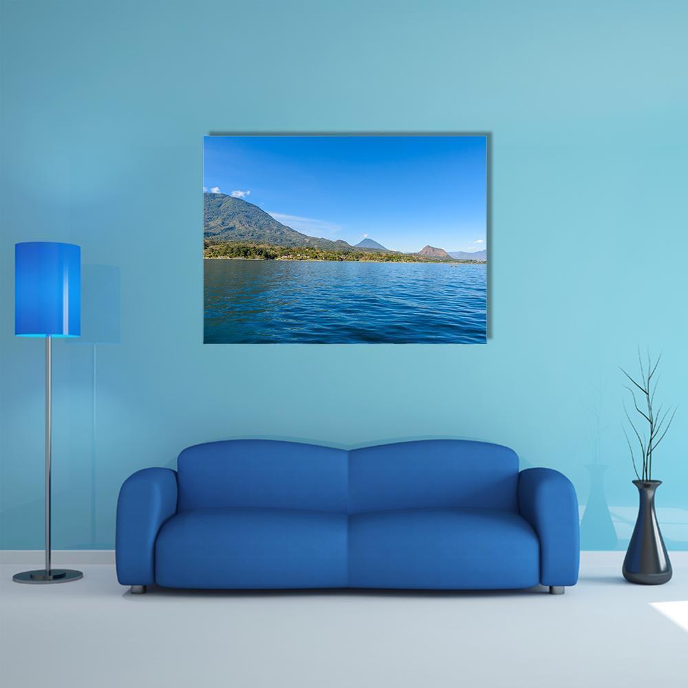Shore of San Lucas Toliman, Lake Atitlan Canvas Wall Art in green and blue, single panel hung on a wall