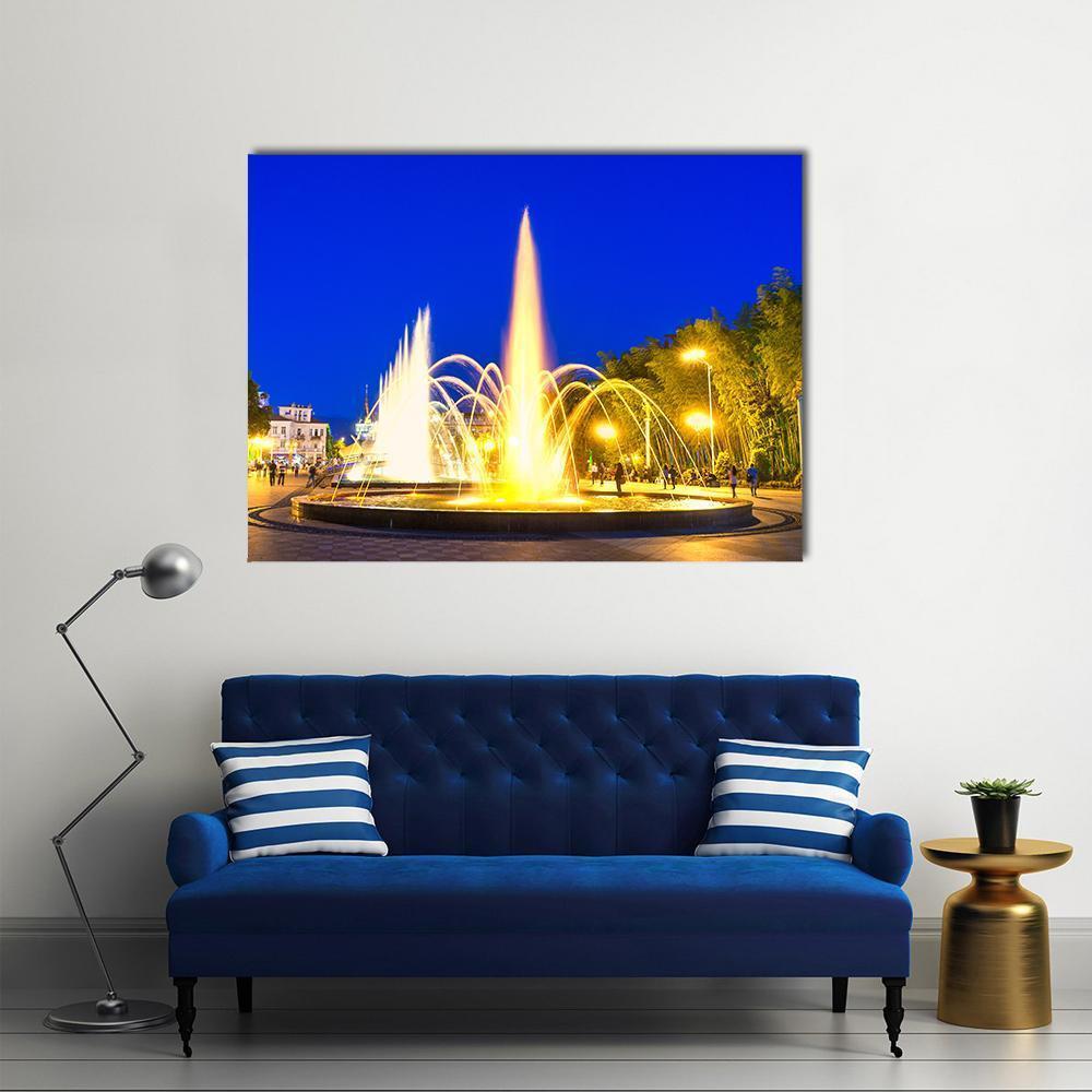 Dancing Fountains at Night in Batumi Canvas Wall Art in gold, yellow and blue, single panel hung on a wall