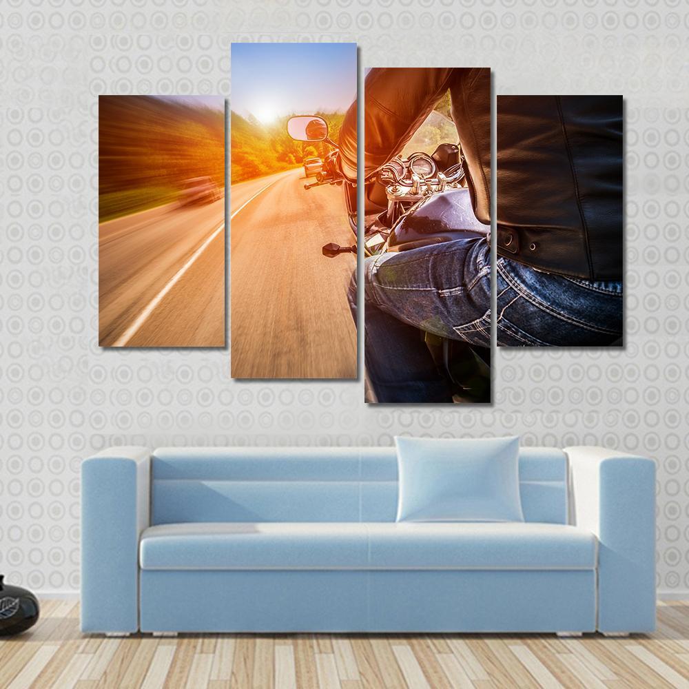 Side View Of Biker Driving A Motorcycle Rides Along The Road Canvas Wall Art-4 Pop-Gallery Wrap-50" x 32"-Tiaracle