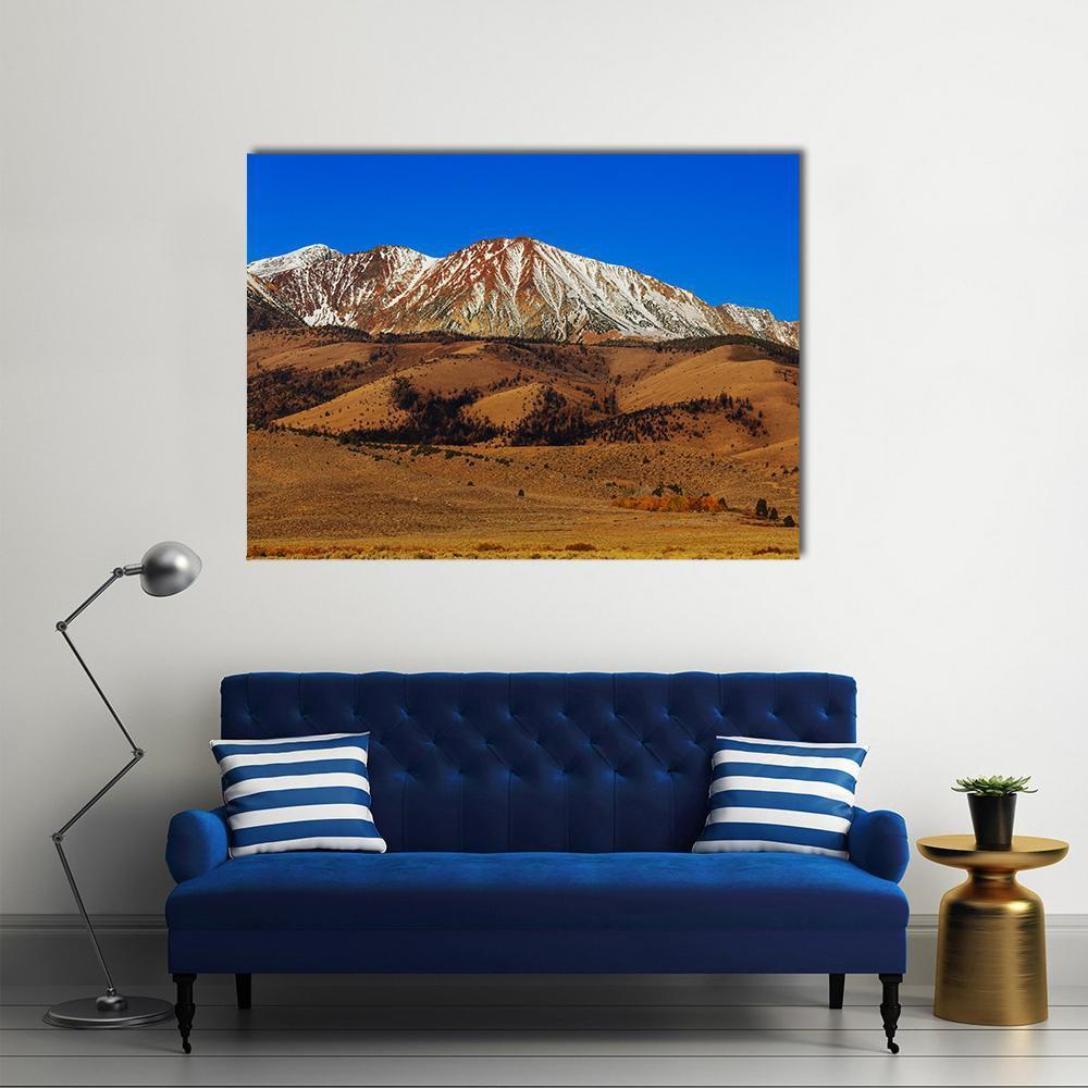 Sierra Nevada Mountain Range in Autumn Canvas Wall Art in brown, orange and blue, single panel hung on a wall