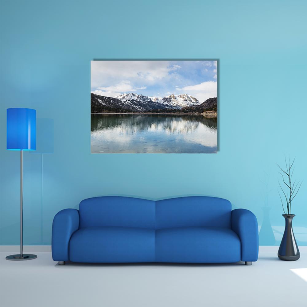 Sierra Nevada Mountains and Lake Reflection Canvas Wall Art in white, gray and blue, single panel hung on a wall