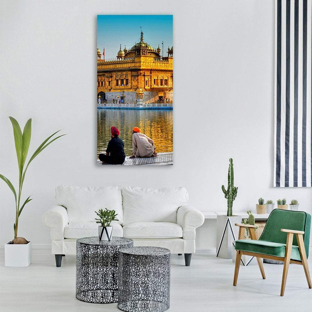Golden Temple in Amritsar Vertical Canvas Wall Art in gold, yellow and blue, single vertical panel hung on a wall