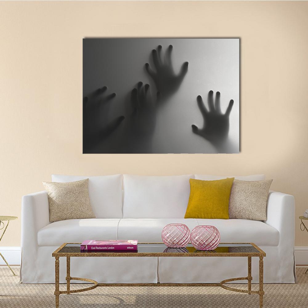 Silhouettes of Hands on Frosted Surface Canvas Wall Art in black, white and gray, single panel hung on a wall