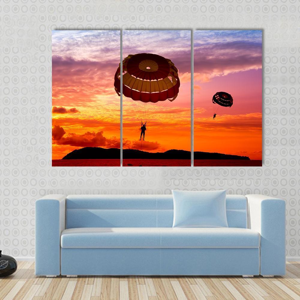 Silhouette Of A Para-Sailors At Sunset Canvas Wall Art-4 Pop-Gallery Wrap-50" x 32"-Tiaracle