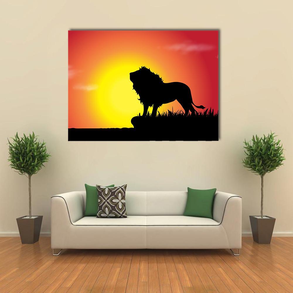 Lion Silhouette at Sunset Canvas Wall Art in black, orange and yellow, single panel hung on a wall