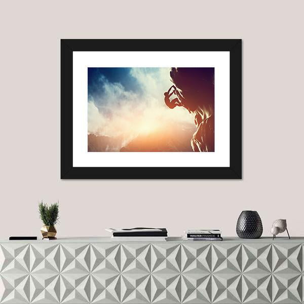 Silhouette Of Man Climbing On Rock Canvas Wall Art-1 Piece-Framed Print-20" x 16"-Tiaracle