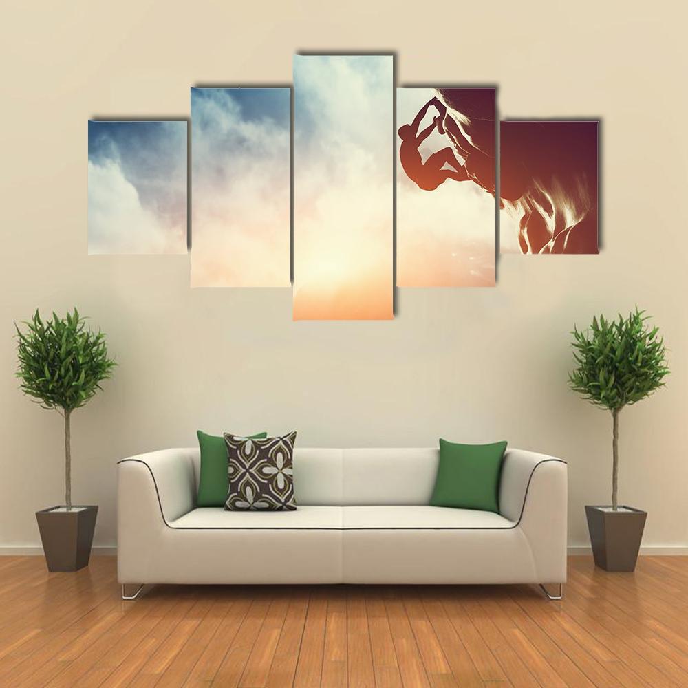 Silhouette Of Man Climbing On Rock Canvas Wall Art-3 Horizontal-Gallery Wrap-37" x 24"-Tiaracle