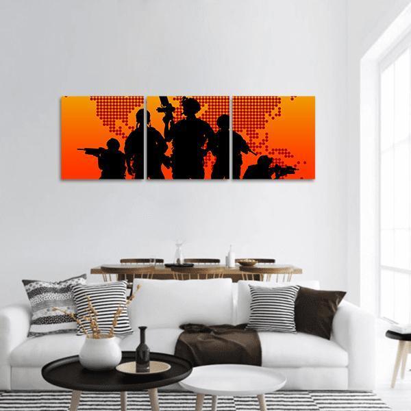 Soldier Silhouettes Over Dotted World Map Panoramic Canvas Wall Art in black, red and orange, hung on a wall