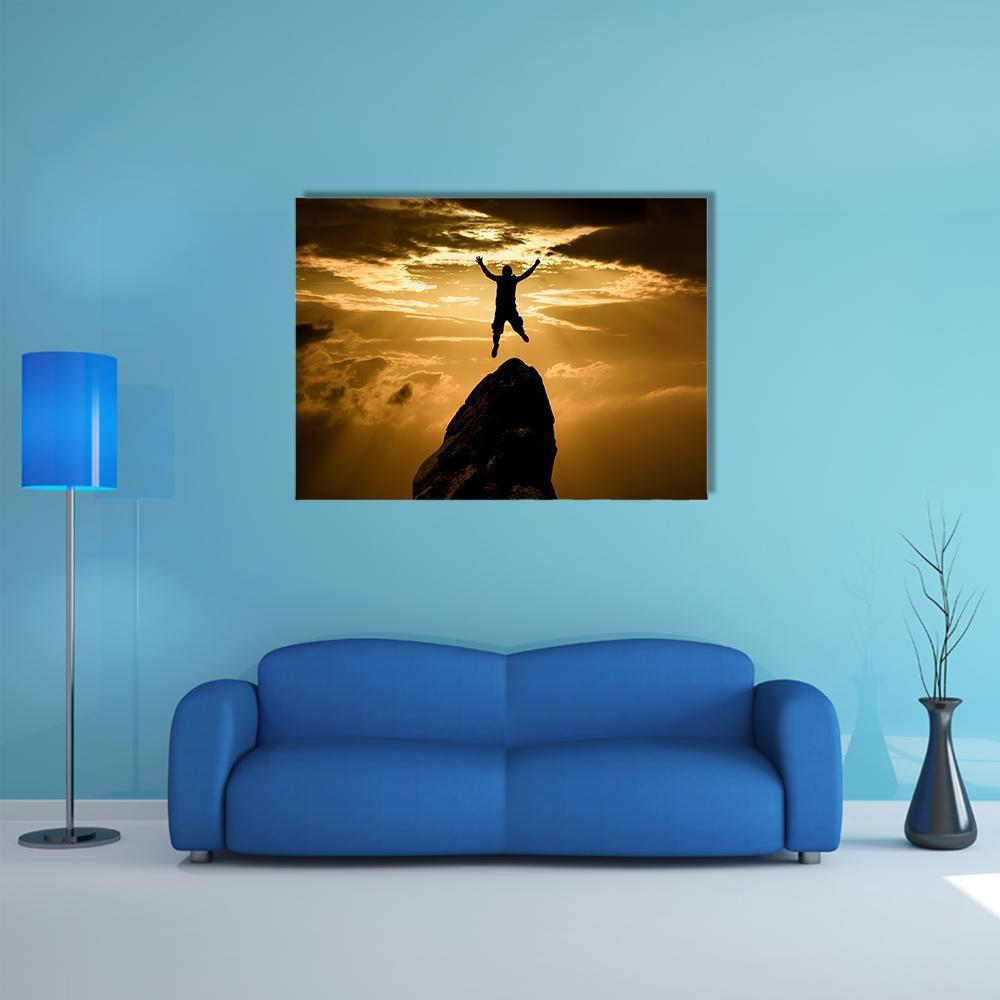 Silhouette of Success Canvas Wall Art in black, gold and yellow, single panel hung on a wall