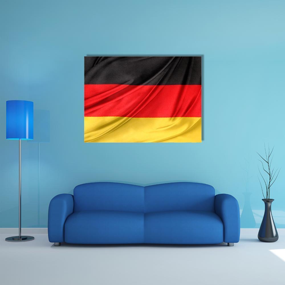 Silky German Flag Canvas Wall Art in black, red and yellow, single panel hung on a wall