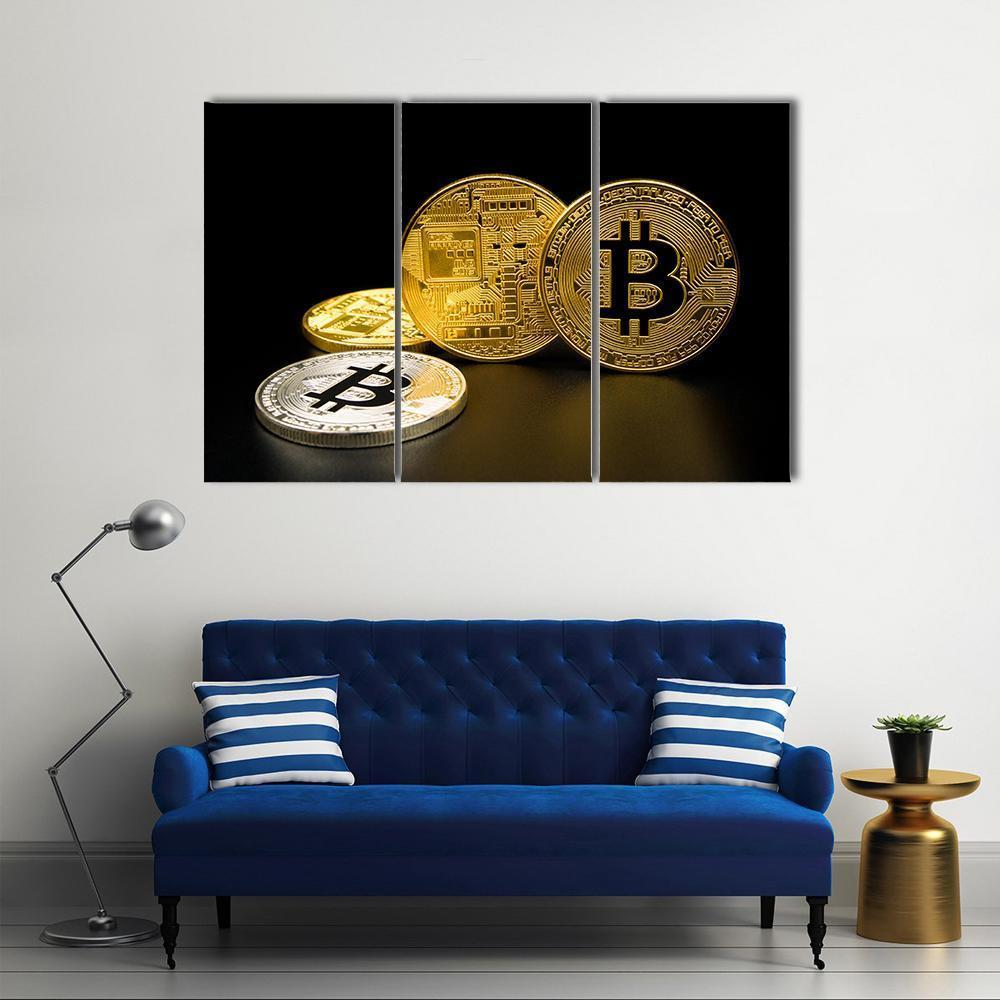 Two Gold and One Silver Bitcoin Coins Canvas Wall Art in black, gold and silver, 5 panel Pop layout hung on a wall