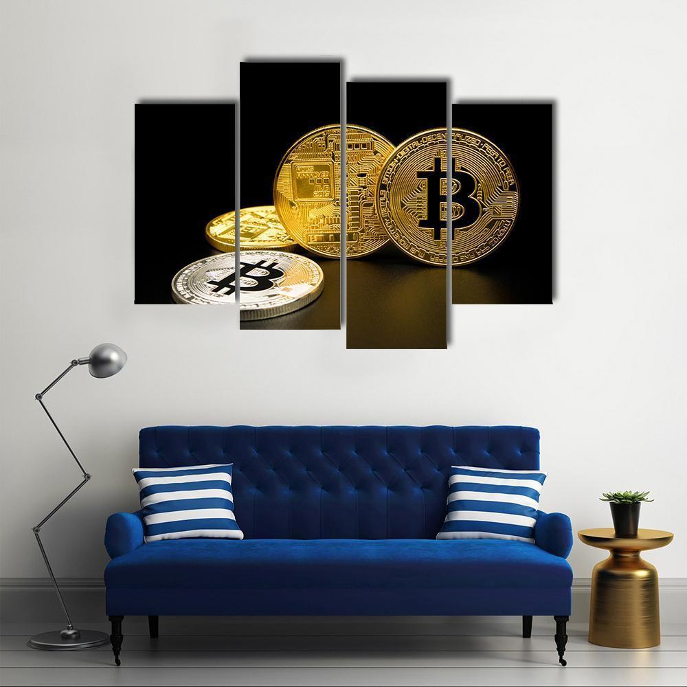 Two Gold and One Silver Bitcoin Coins Canvas Wall Art in black, gold and silver, 4 panel Pop layout hung on a wall