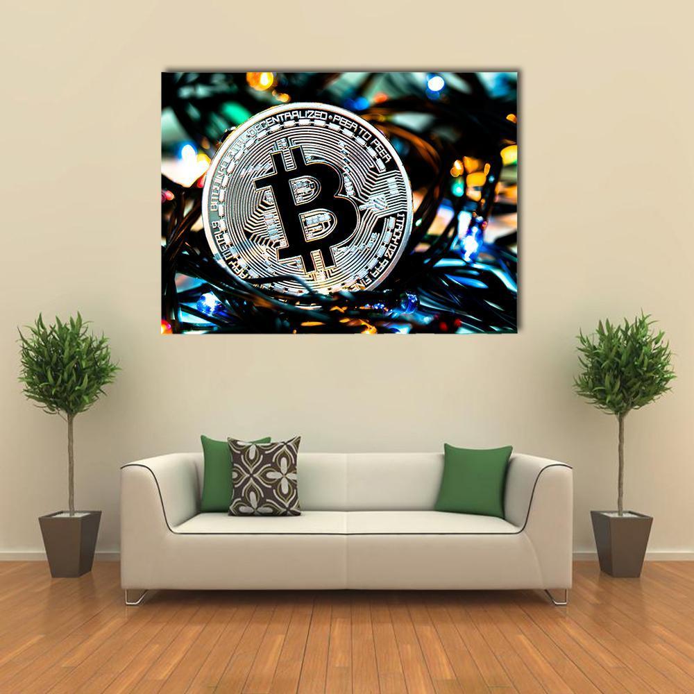 Silver Bitcoin Coin Close-up Canvas Wall Art in black, silver and blue, 4 panel Pop layout hung on a wall