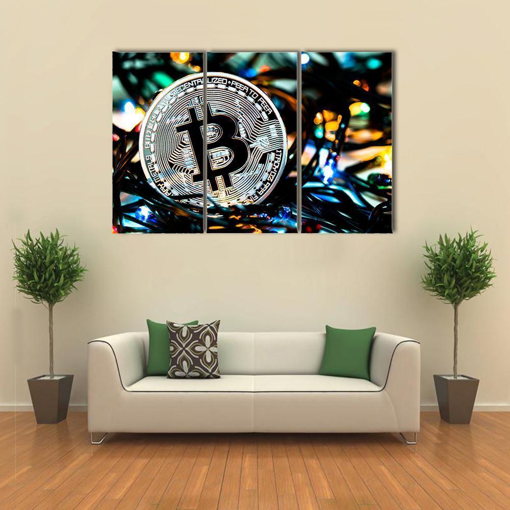 Silver Bitcoin Coin Close-up Canvas Wall Art in black, silver and blue, 4 panel Pop layout hung on a wall