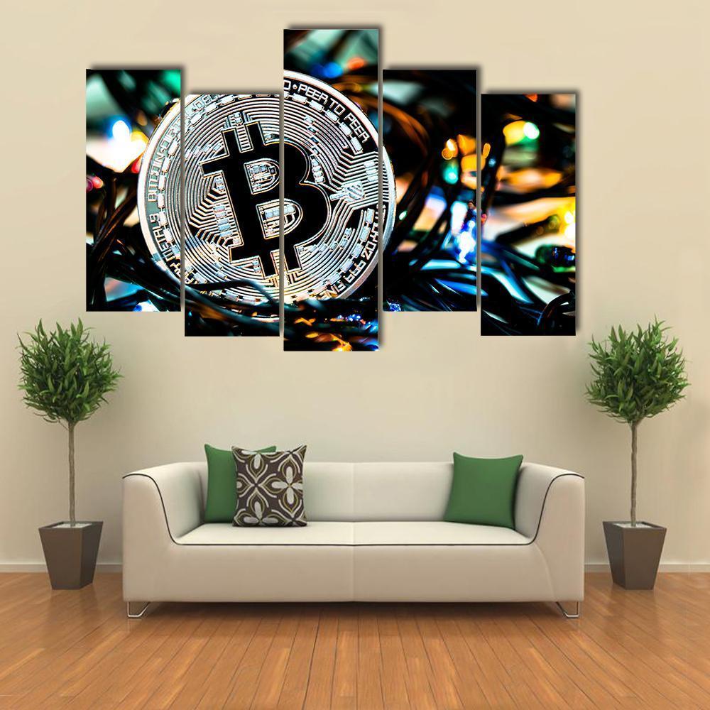 Silver Bitcoin Coin Close-up Canvas Wall Art in black, silver and blue, 5 panel Pop layout hung on a wall