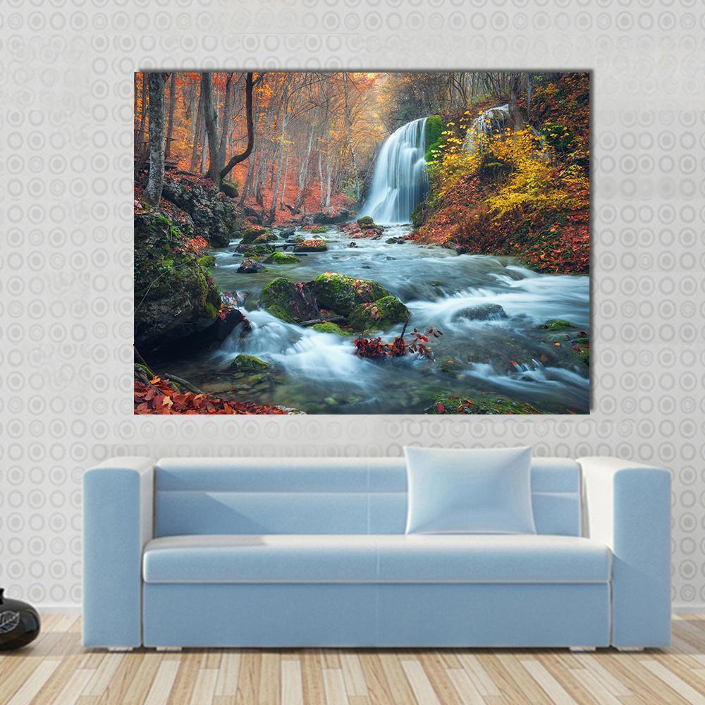 Silver Stream Waterfall in Grand Canyon of Crimea at Sunset Canvas Wall Art in brown, orange and blue, single panel hung on a wall