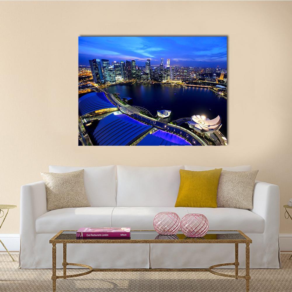 Singapore Skyline at Night Canvas Wall Art in black, blue and navy, single panel hung on a wall