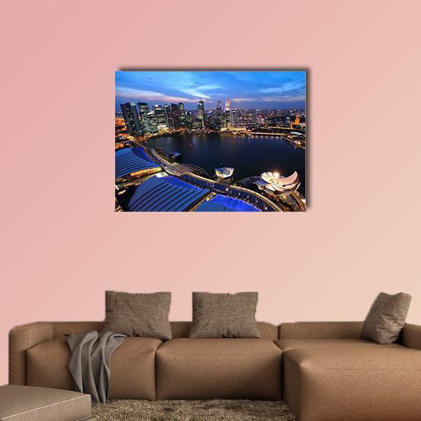 Singapore Skyline at Night Canvas Wall Art in black and blue, single panel hung on a wall