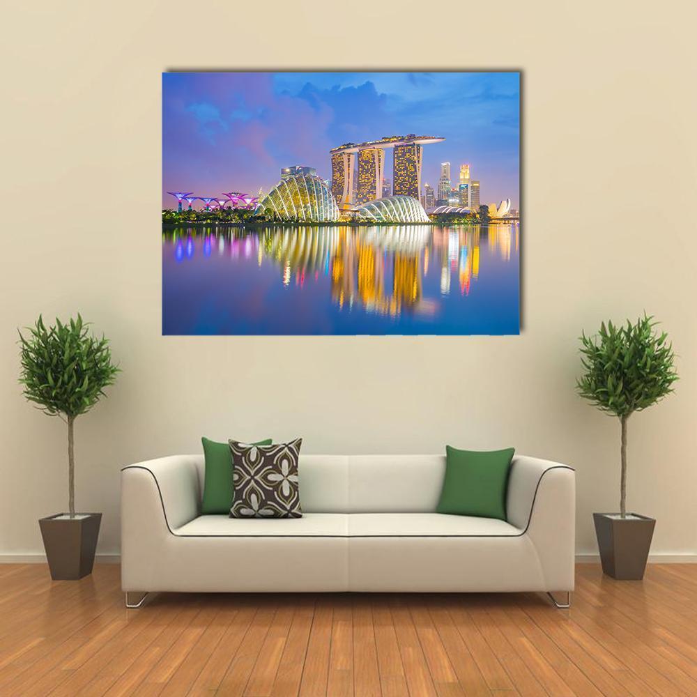 Singapore Skyline at Twilight Canvas Wall Art in gold, blue and purple, single panel hung on a wall
