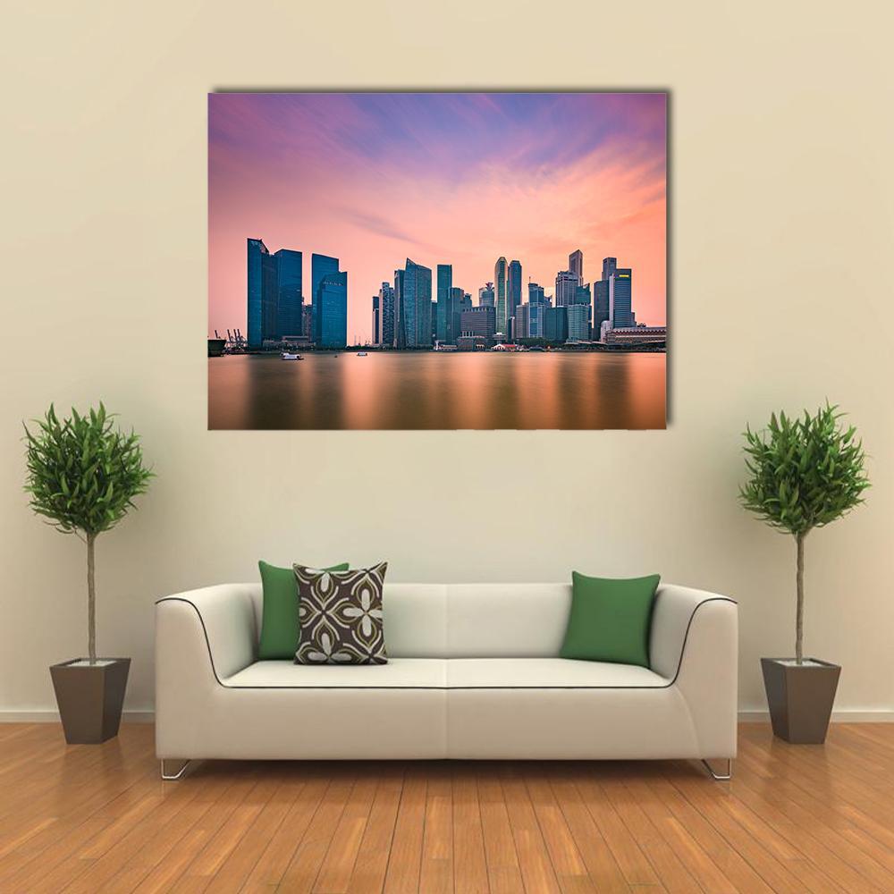 Singapore Skyline at Marina Bay Canvas Wall Art in orange, blue and pink, single panel hung on a wall