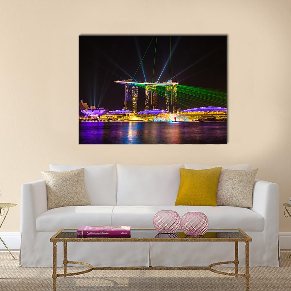 Singapore Skyline at Night Canvas Wall Art in black, green and purple, single panel hung on a wall