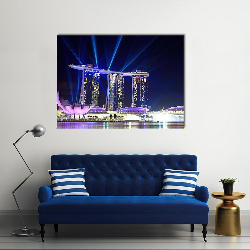 Singapore Skyline at Night Canvas Wall Art in black, blue and purple, single panel hung on a wall