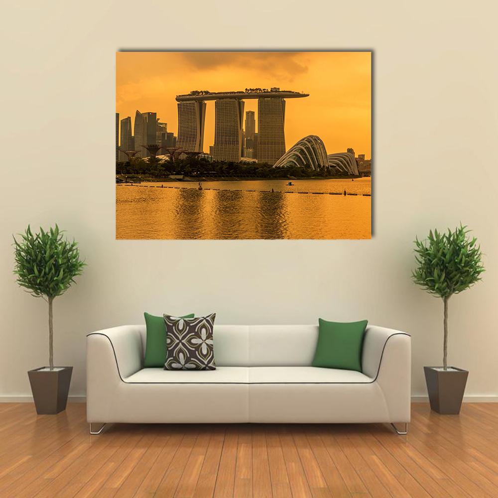 Marina Bay Sands Skyline at Sunset Canvas Wall Art in gold, orange and yellow, single panel hung on a wall