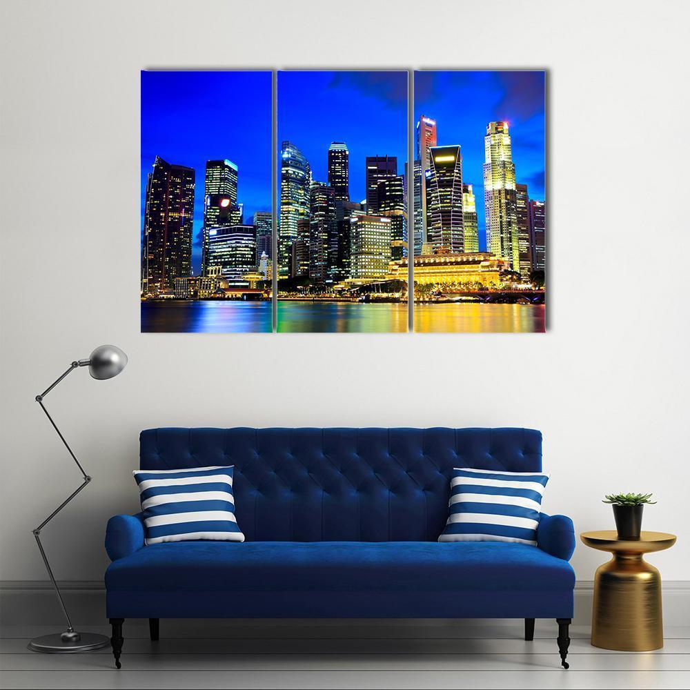 Singapore Skyline Canvas Wall Art in black, yellow and blue, 3 panel horizontal set hung on a wall