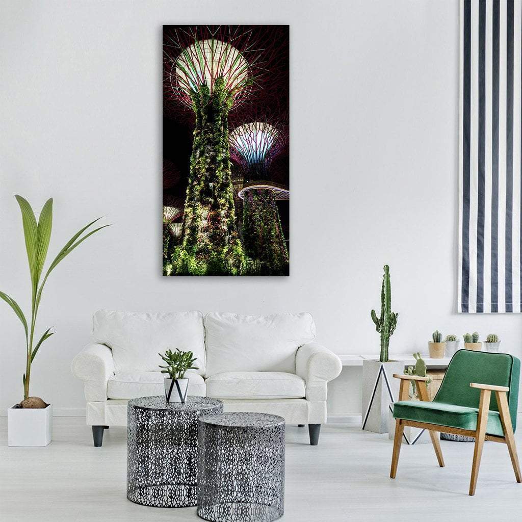 Supertree Grove at Night, Gardens by the Bay, Singapore Vertical Canvas Wall Art in black, green and purple, single vertical panel hung on a wall