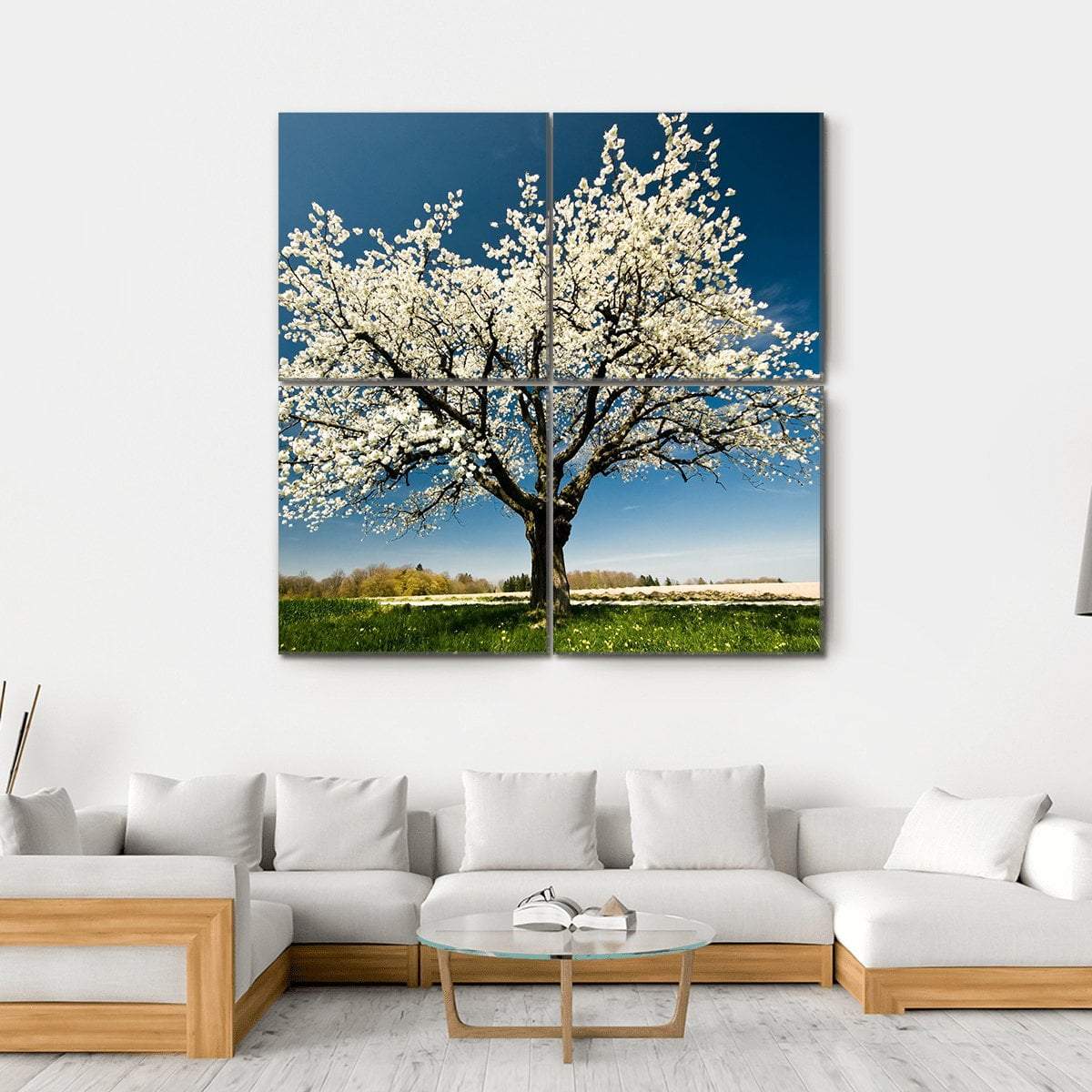 Single Blossoming Tree in Spring Canvas Wall Art in white, green and blue, hung on a wall