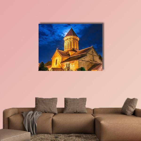 Sioni Cathedral, Georgia at Night Canvas Wall Art in gold, yellow and blue, single panel hung on a wall